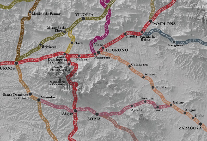 May include: A map of Spain with various cities and towns marked with black dots. The map shows the routes of different historical pilgrimage trails, including the Camino Frances, Camino del Norte, and Camino Aragones. The trails are marked with different colored lines.