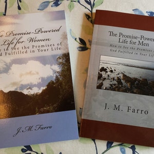 May include: Two books with brown covers and white text. The book on the left has a blue bottom edge and a photo of a mountain range with clouds. The book on the right has a gray bottom edge and a photo of a rocky beach with water.