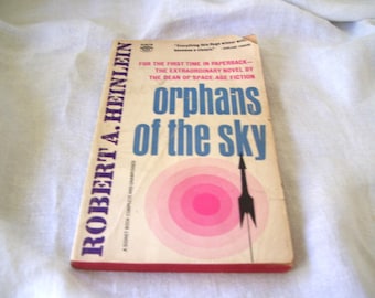 Huérfanos del cielo de Robert Heinlein, edición de bolsillo de 1965.