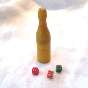 1920s Bakelite Bottle with Miniature Dice 2.5 inches
