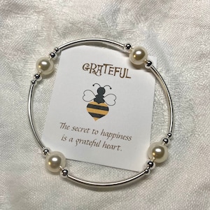 Grateful-parel met middelgrote 8 mm crèmeparels/sterlingzilver