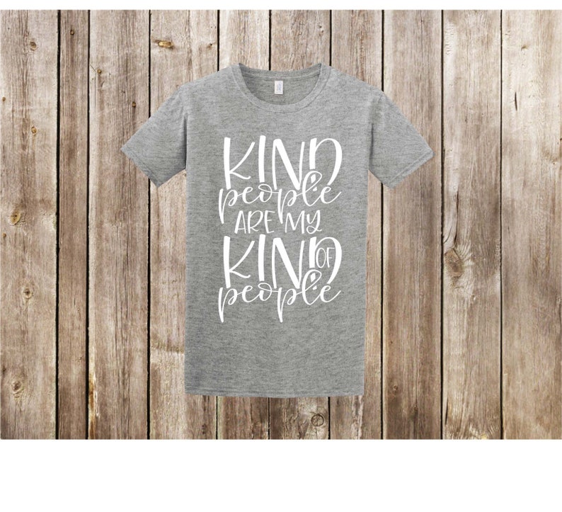 May include: Gray t-shirt with the text "Kind people are my kind of people" in white lettering.