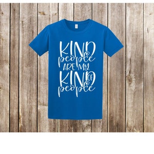 May include: A royal blue t-shirt with white text that reads "Kind people are my kind of people".