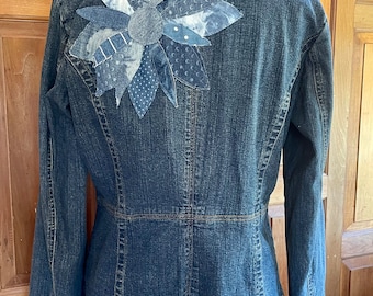 Repurposed upcycled recycled denim jacket. Appliquéd flowers. Size L. Bust 40”