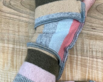 Arm wrist warmers made from preloved cashmere sweaters in fun stripes.