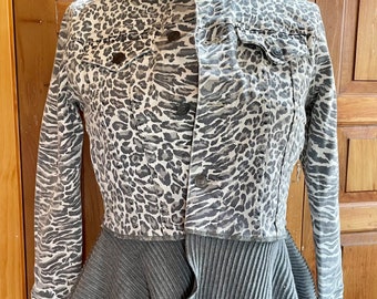 Animal print denim jacket with cotton sweater flounce. Size M. Bust 36”.