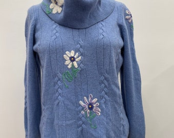 Cabled Cashmere sweater. Mended with needle felting. Size L. Beautiful cables and large cowl. Light blue. One of a kind wearable art.