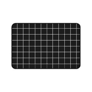 May include: A rectangular black mousepad with a white grid pattern. The grid is composed of evenly spaced horizontal and vertical lines, creating a series of squares. The edges of the mousepad are rounded.