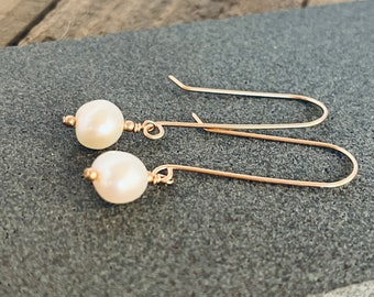 Pearl earrings with long gold ear wires, earrings for bride, gift for jewelry lover.