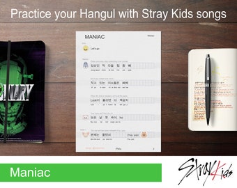 May include: A printable worksheet with Hangul characters from the Stray Kids song "Maniac". The worksheet features a title, lyrics, and a space for writing the Hangul characters. The worksheet is printed on white paper and has a green border.
