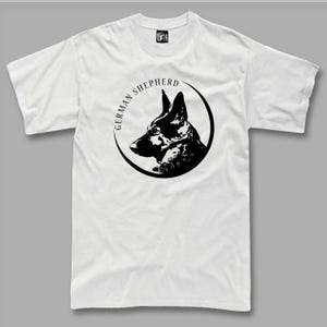 A white t-shirt with a black graphic design depicting a German Shepherd dog's head.