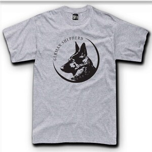 A gray t-shirt with a black graphic design depicting a German Shepherd dog's head.