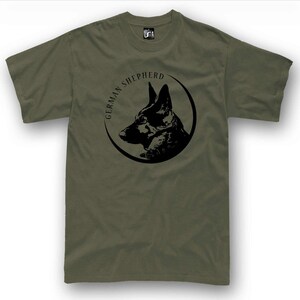 A t-shirt with a graphic design featuring a black silhouette of a German shepherd dog's head within a circular frame.