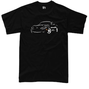 May include: Black t-shirt with a white outline of a sports car. The car design includes headlights, wheels, and body contours. The shirt is made of a soft material and has a crew neck.