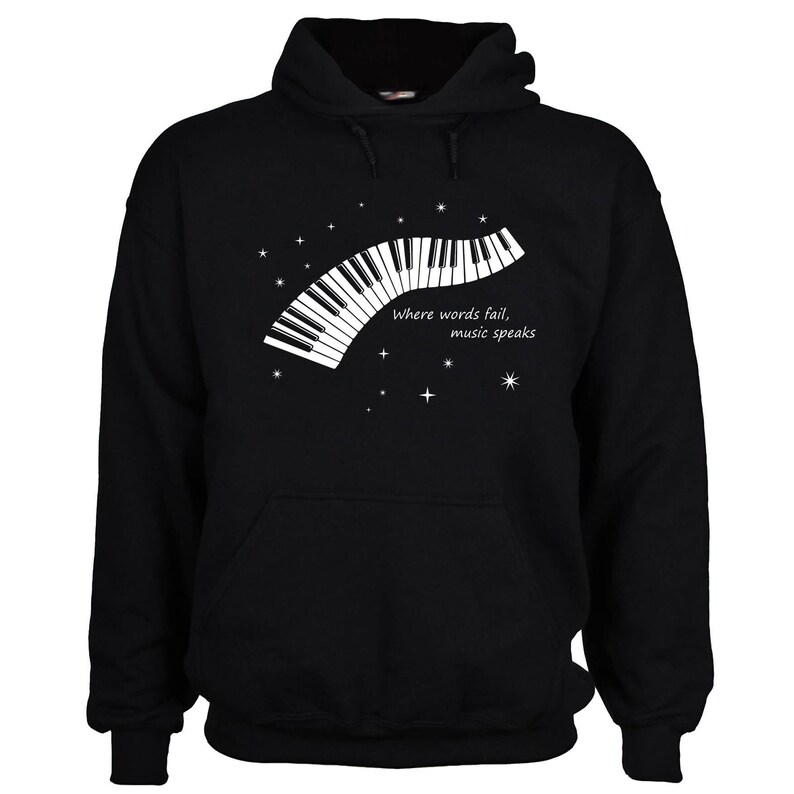 Black hooded sweatshirt with a white graphic of a piano keyboard and the text "Where words fail, music speaks".