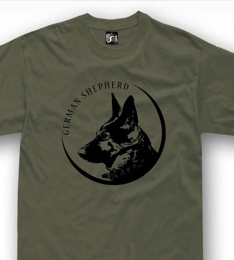 A t-shirt with a graphic design featuring a black silhouette of a German shepherd dog's head within a circular frame.