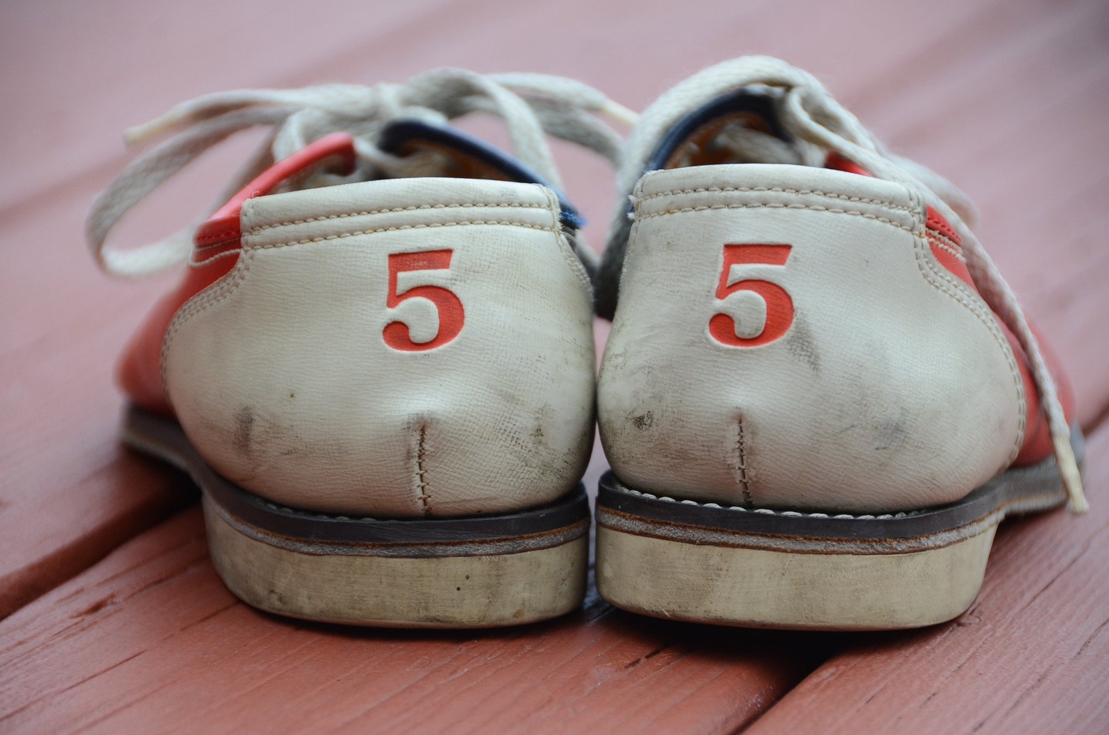 red and blue bowling shoes