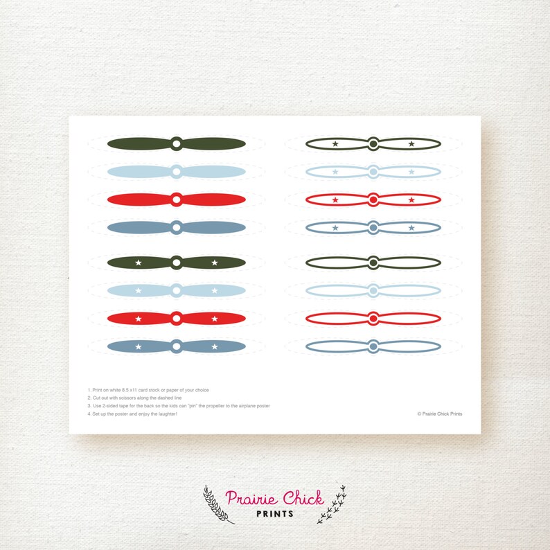May include: A sheet of printable airplane propeller cutouts in shades of red, blue, and green, with star details. Includes instructions for printing and assembly. The Prairie Chick Prints logo is at the bottom.