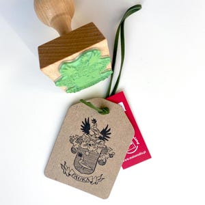 Custom-made Family Crest Stamp mounted on the high-quality wooden handle. Laser engraved rubber of the Coat of Arms Stamp