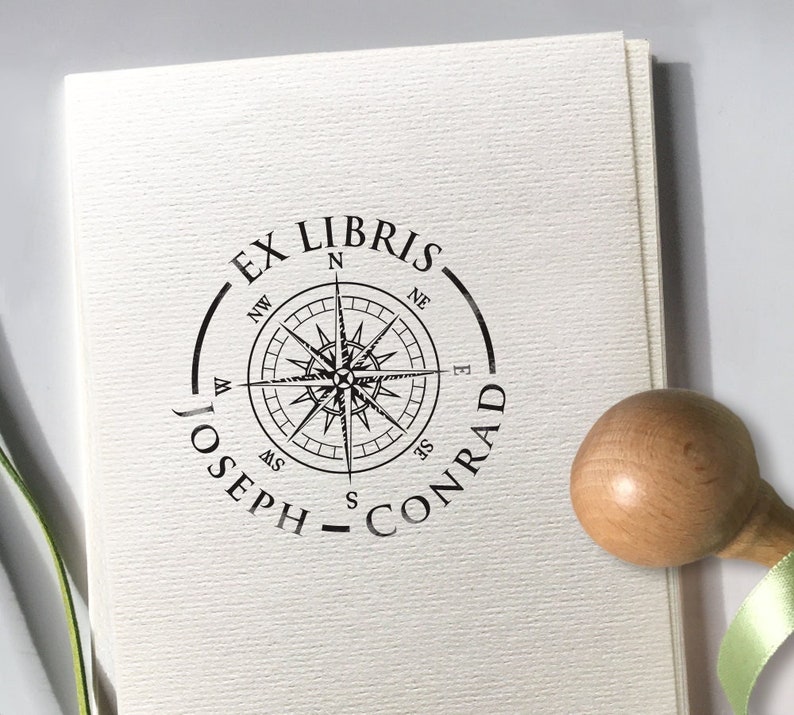 WIND ROSE Personalized Ex Libris Wooden Stamp. Original gift idea for the sailor or sea lover. The illustration shows the marine wind rose with eight cardinal directions on the compass. Around the wind rose image there is a place for the text.