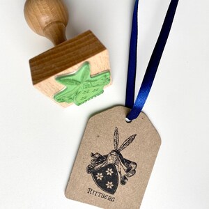 Custom-made Family Crest Stamp mounted on the high-quality wooden handle. Laser engraved rubber of the Coat of Arms Stamp