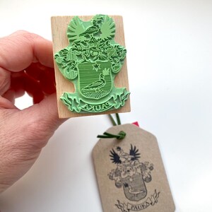 Custom-made Family Crest Stamp mounted on the high-quality wooden handle. Laser engraved rubber of the Coat of Arms Stamp
