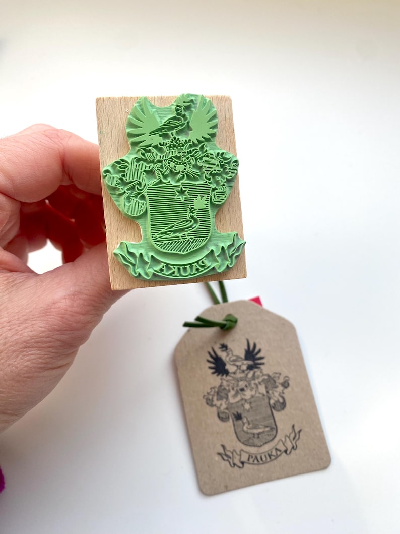Custom-made Family Crest Stamp mounted on the high-quality wooden handle. Laser engraved rubber of the Coat of Arms Stamp
