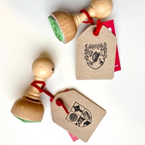 Custom-made Family Crest Stamp mounted on the high-quality wooden handle. Laser engraved rubber of the Coat of Arms Stamp