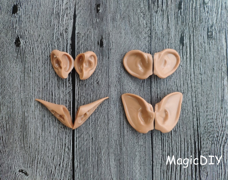May include: Three pairs of elf ears made of a flexible, skin-toned material. The ears are designed to be attached to the head for a costume or cosplay.