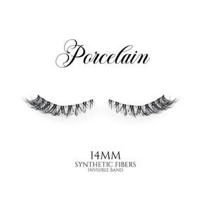 May include: A pair of black false eyelashes with the word "Porcelain" in elegant script above. The text below reads "14MM SYNTHETIC FIBERS INVISIBLE BAND". The lashes are displayed on a white background.