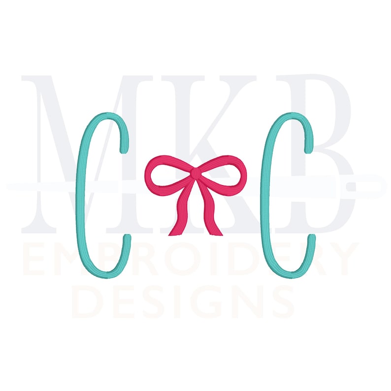 May include: Monogrammed embroidery design with the letters "C" and "C" on either side of a pink bow. The letters are turquoise blue.