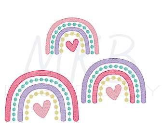 May include: Three rainbow arches with hearts in the center. The rainbows are pink, purple, and teal. The hearts are pink.