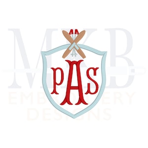May include: A blue and white shield with a red monogram "PAS" and crossed ski poles in the centre. The shield is surrounded by a white border.
