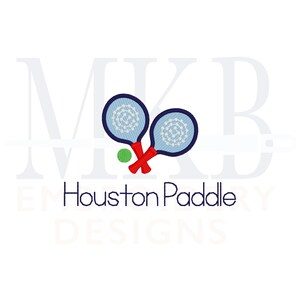 May include: Two blue and white paddle rackets with red handles crossed over each other with a green ball in the middle. The text "Houston Paddle Designs" is below the rackets.