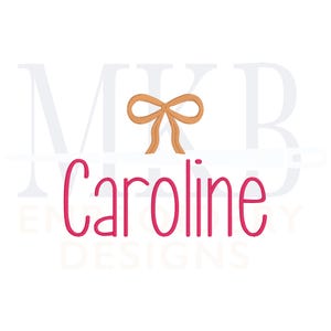 May include: A pink monogram design with the letters "MKB" and the name "Caroline" below. A brown bow is centered between the letters.