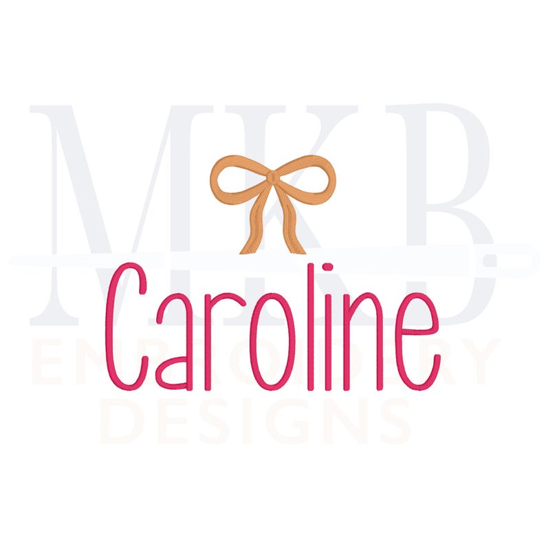 May include: A pink monogram design with the letters "MKB" and the name "Caroline" below. A brown bow is centered between the letters.