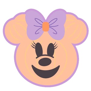 May include: A peach-colored pumpkin shaped like a mouse head with a purple bow featuring an orange center. The pumpkin has dark brown eyes with eyelashes, a dark brown nose, and a dark brown mouth, all outlined in a light purple border.
