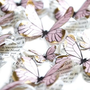 Blush paper butterflies with metallic gold accents