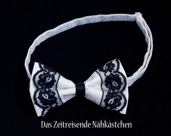 Stylish bow tie, white jaquard with lace trims, pre-tied