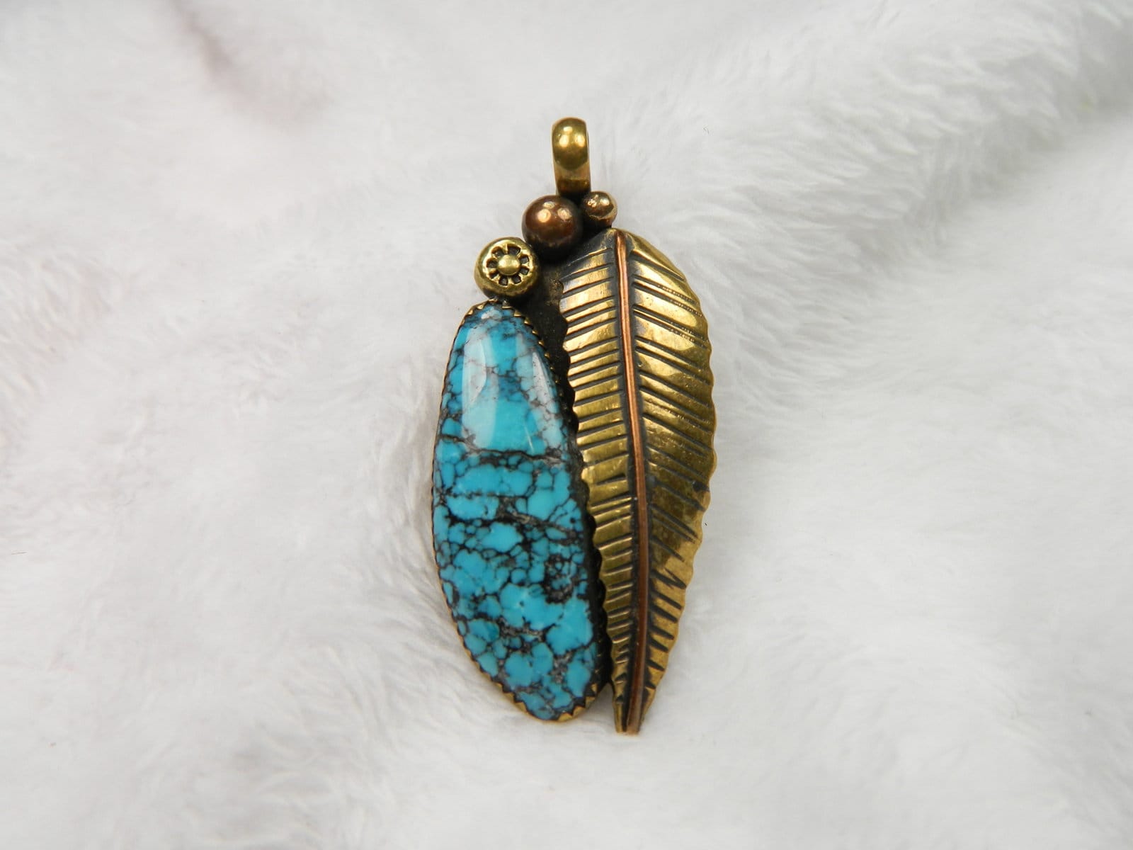 Lone mountain Nevada Turquoise pendent by Arash set in brass!