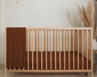 rust colored crib sheet