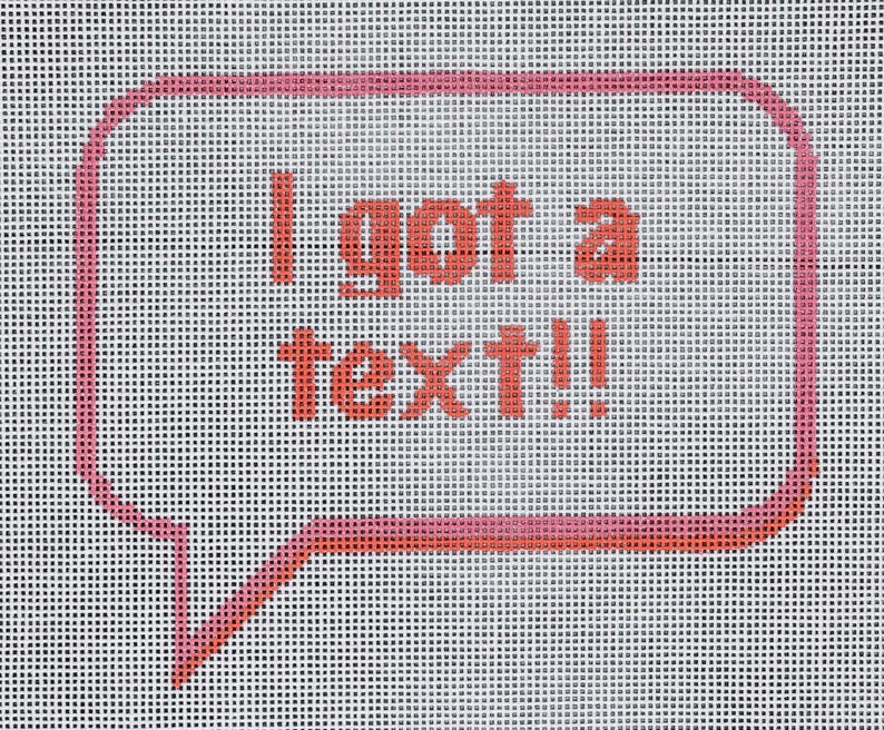 K&ouml;nnte beinhalten: Eine rosa Sprechblase mit wei&szlig;em Hintergrund und dem Text "I got a text!" in Rot.