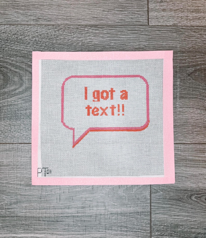 K&ouml;nnte beinhalten: Rosa Leinwand mit einer roten Sprechblase, auf der "Ich habe eine SMS bekommen!" steht.