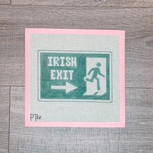 May include: A green and white sign with the text "IRISH EXIT" and a stick figure running through a doorway. The sign is on a pink background.