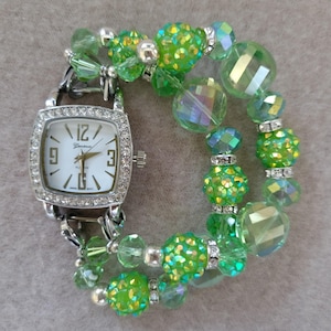 Women&#39;s vibrant green stretch watch bracelet with small white square watch face