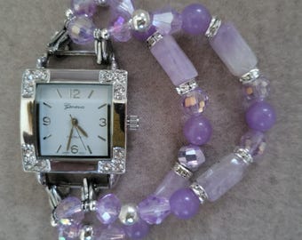 Woman's lovely lilac stretch beaded watch bracelet with square watch face.