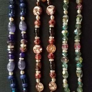 Women&#39;s interchangeable, stretch watch bands sell for 20.00 EACH. Specify which band you prefer.