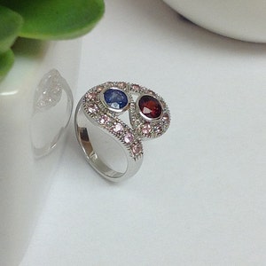 Genuine Blue Sapphire, Rhodolite Garnet and Pink Sapphire S Shape Ring