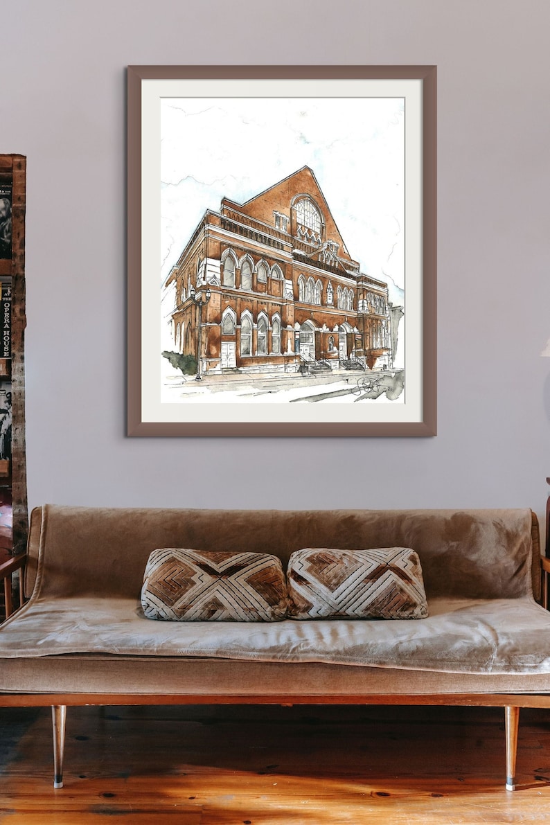 Puede incluir: Una pintura de acuarela de un edificio de ladrillo con ventanas arqueadas y una gran c&uacute;pula. El edificio est&aacute; pintado en tonos de marr&oacute;n, rojo y blanco. La pintura est&aacute; enmarcada en un marco marr&oacute;n.