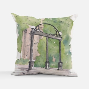 Coussin décoratif avec aquarelle représentant l'arche du campus d'Athènes de l'université de Géorgie – Idées cadeaux pour l'obtention du diplôme